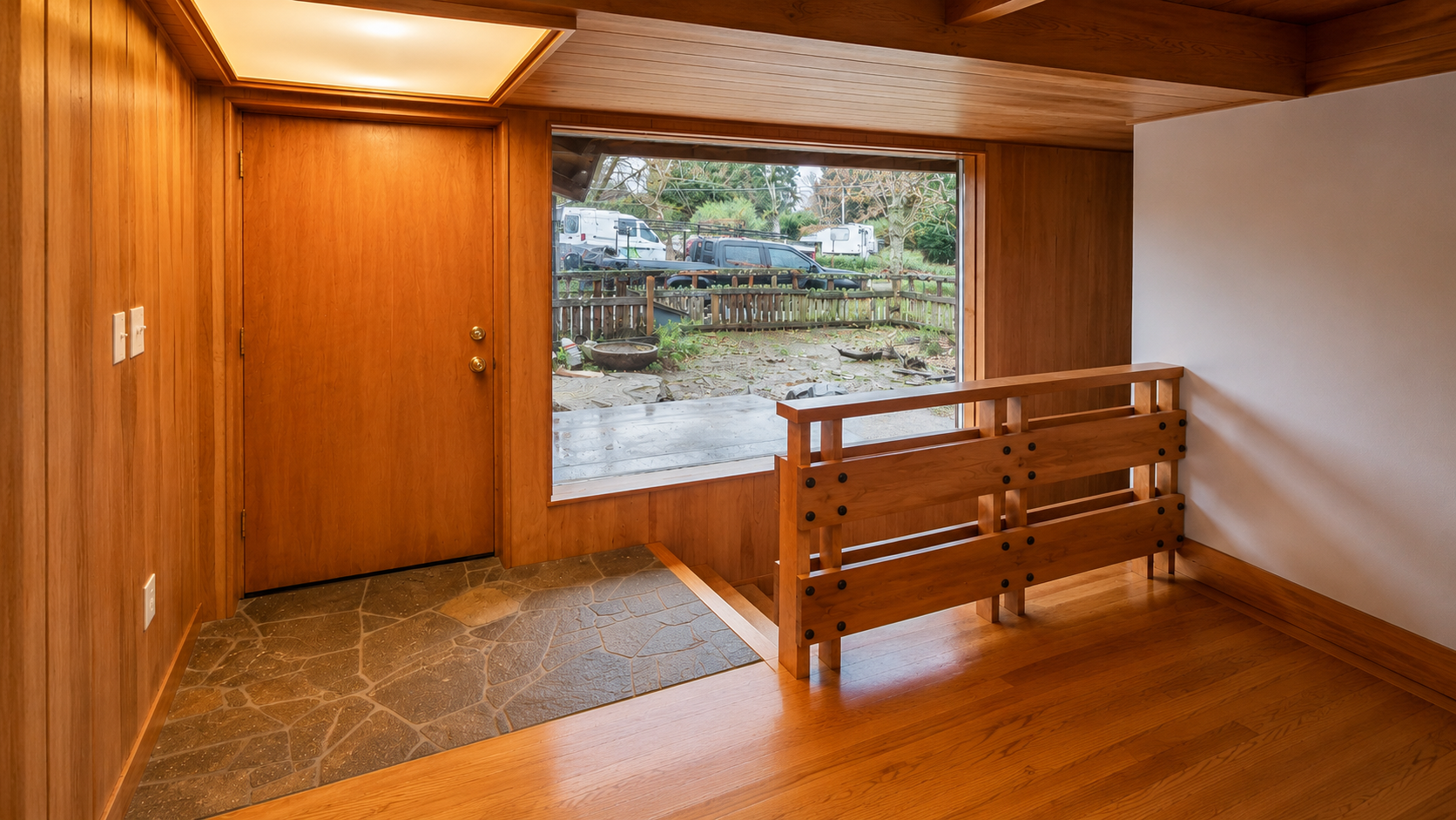 Hallway and stairway with custom millwork in the Nixon basement ADU.