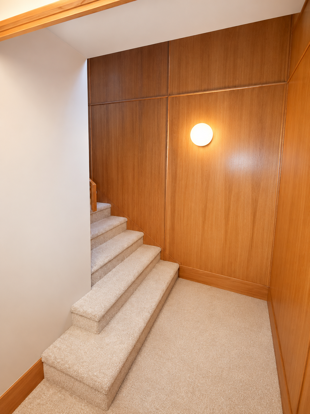 Guest bedroom with modern finishes in the Nixon basement ADU in Milwaukie, Oregon.