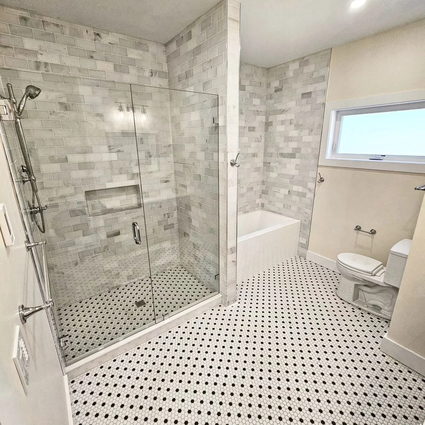Custom tile shower and bathroom remodel details inside a newly constructed Portland ADU.